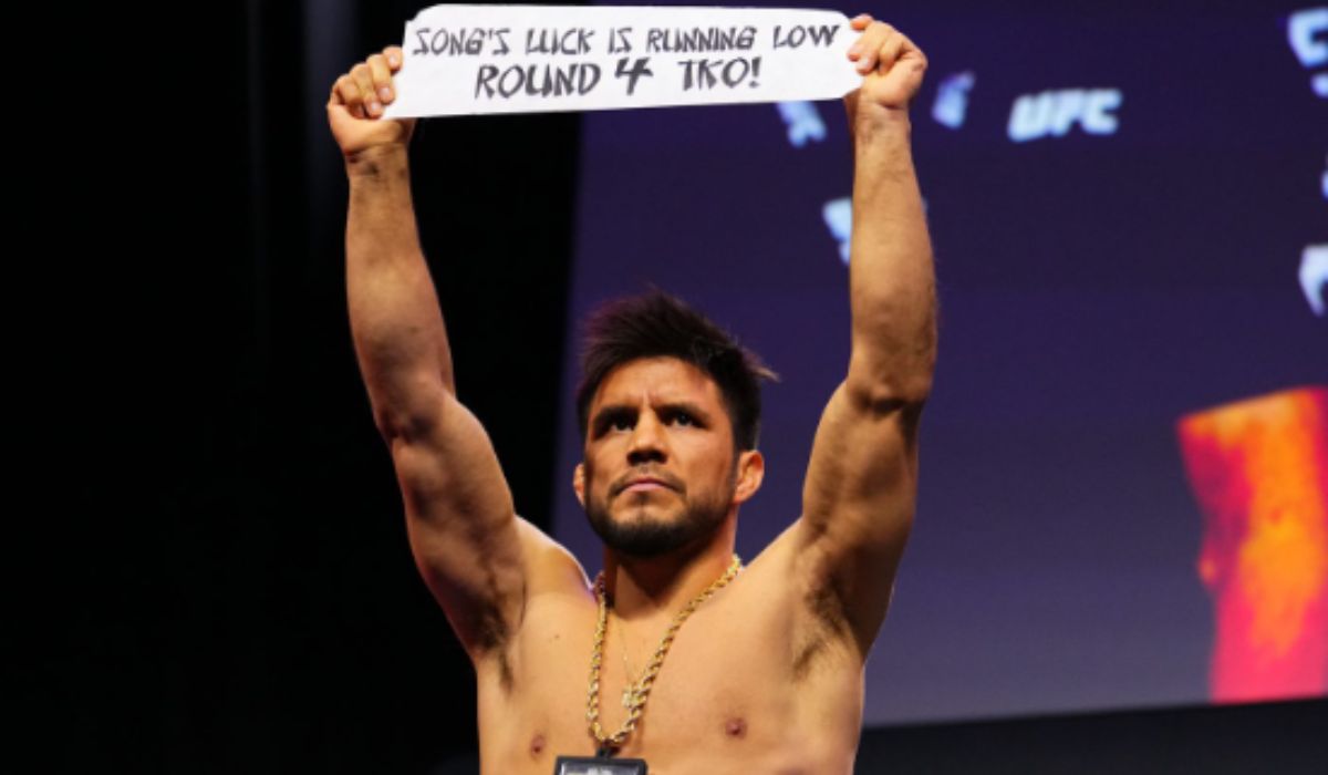 Henry Cejudo Breaks Fortune Cookie, Reveals Fight Prediction Before Final Staredown